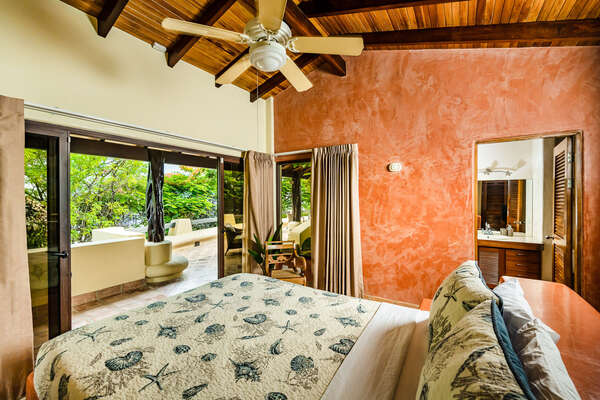 Into the other one, you'll have a queen-size bed with ceiling fan and air conditioning, direct access to the terrace