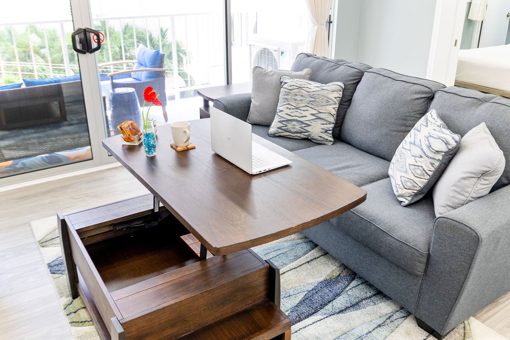 Feel at ease working in the living room while sitting on the queen-size sleeper sofa!