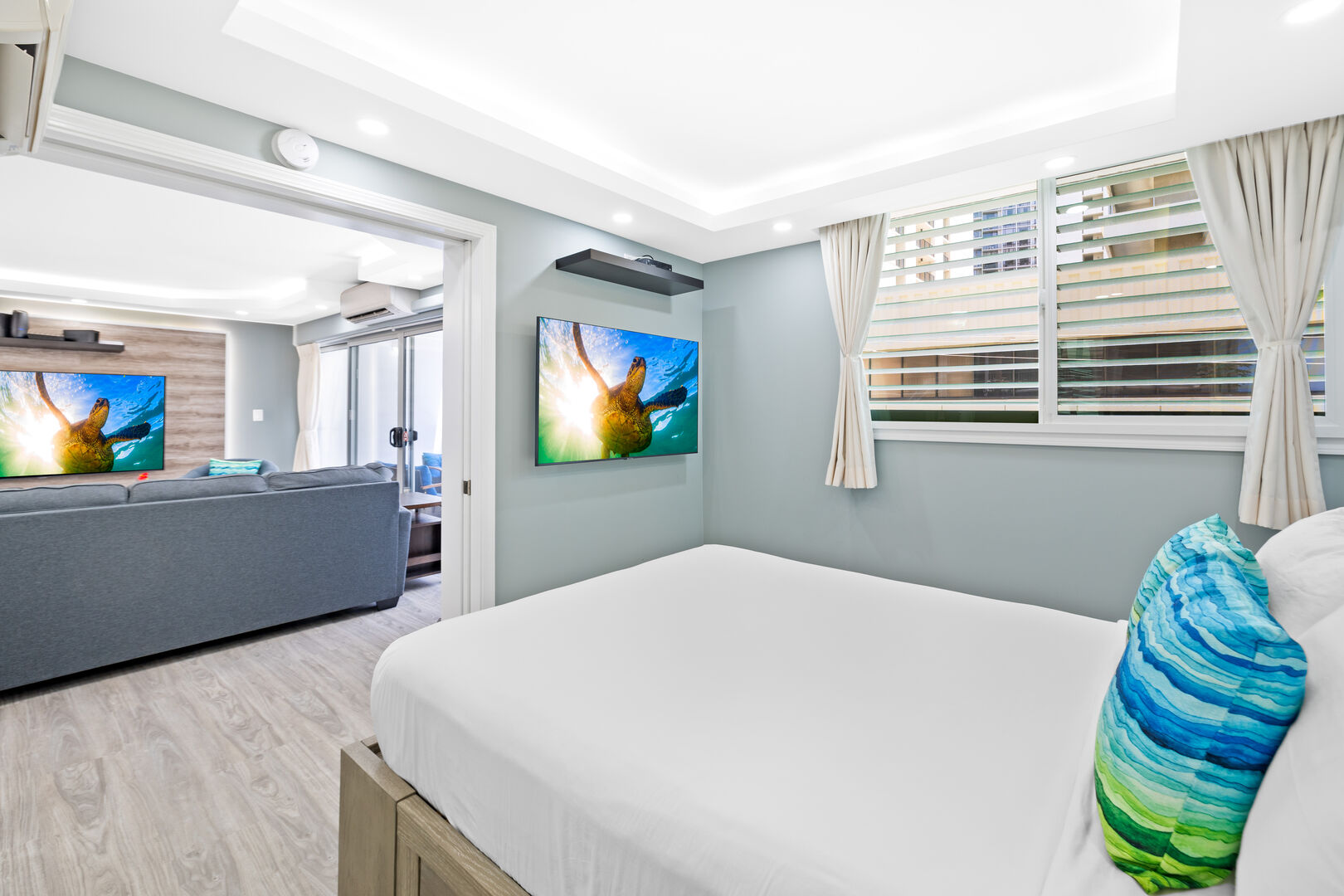 Enjoy watching your favorite shows while resting on a queen-size bed in the guest bedroom!