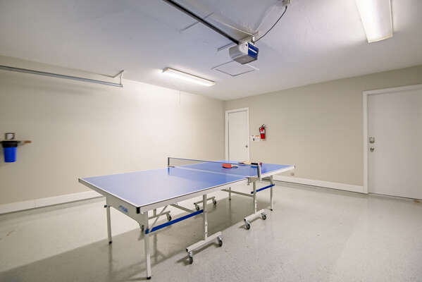 Two car garage with ping-pong table