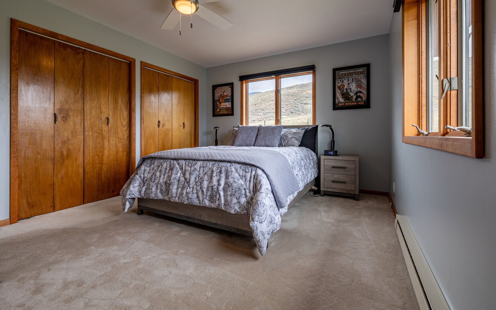 Bedroom with queen bed and beautiful mountain views