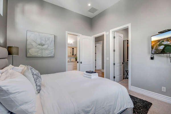 Bedroom Three with King Bed, Smart TV and En Suite Bathroom