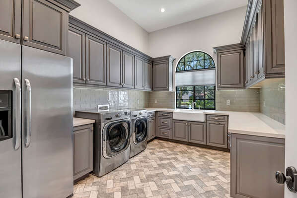 Laundry Room with Washer and Dryer, Utility Sink and Secondary Fridge