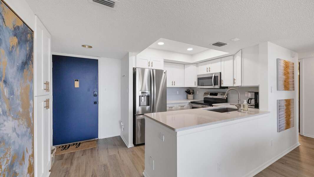 Open, fully-equipped kitchen. Beautiful flooring.