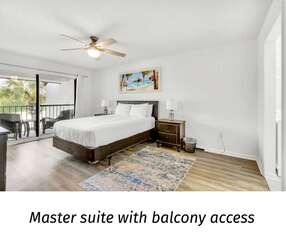 Master suite (Queen) with balcony access