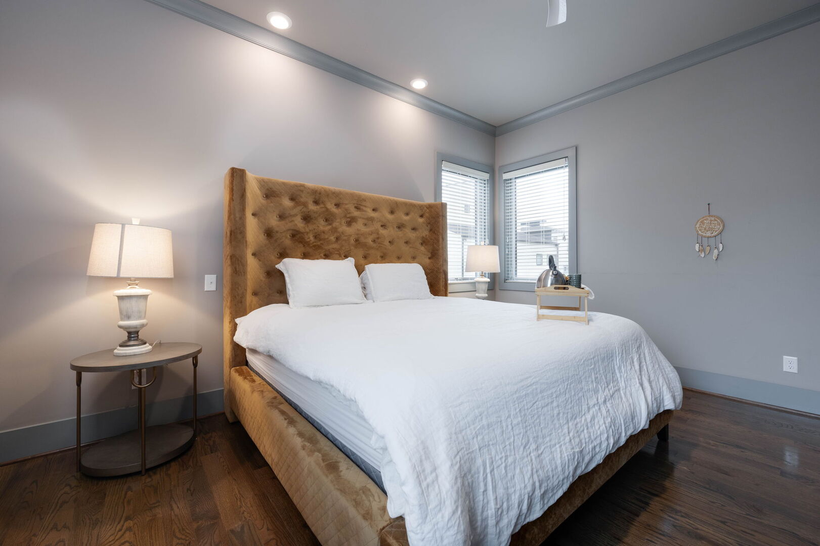 1st Floor: Primary Bedroom featuring a King Bed with a flat-screen SMART TV and ensuite primary bathroom.