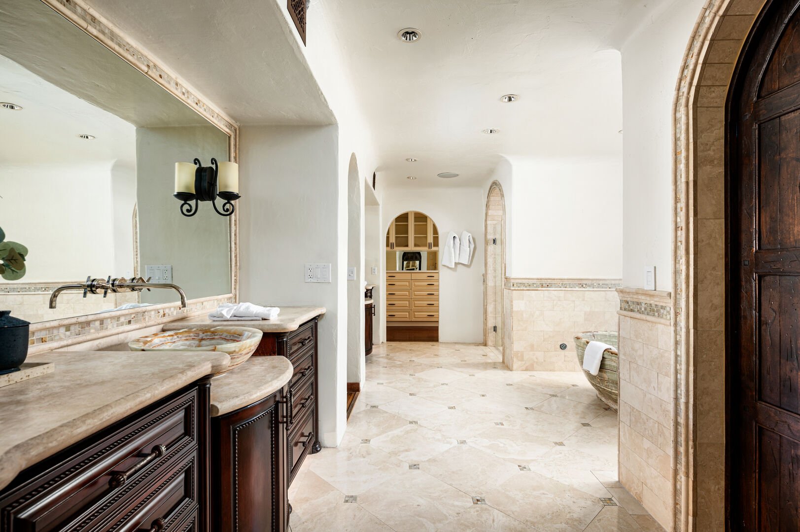 Master bathroom with double sinks.