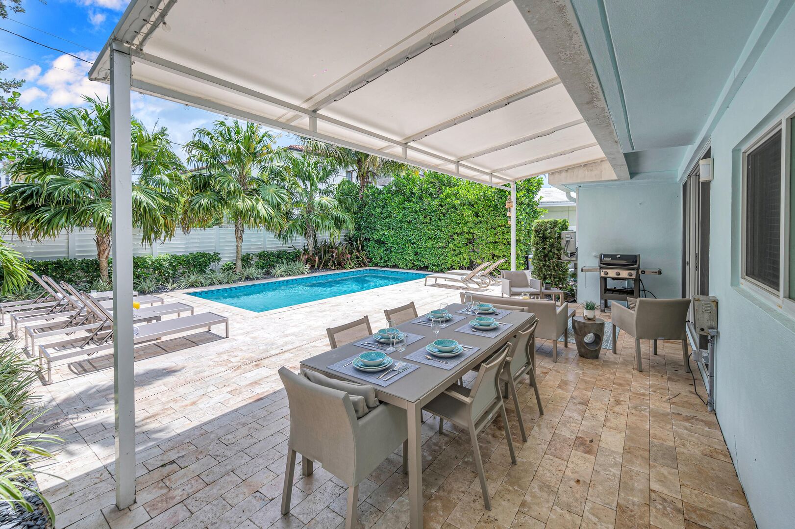 Dine in style and bask in the warmth of our heated pool, as our outdoor seating for six creates the ideal setting for memorable al fresco gatherings and leisurely meals.