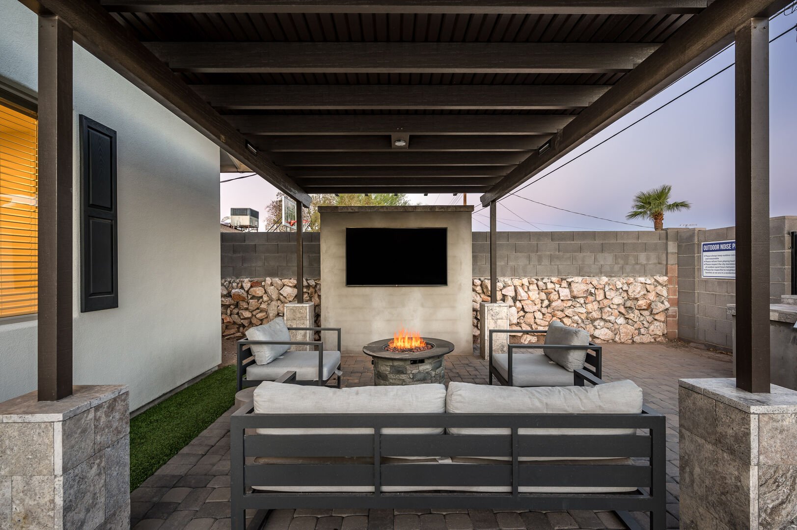 Outdoor living with grilling and prep space.