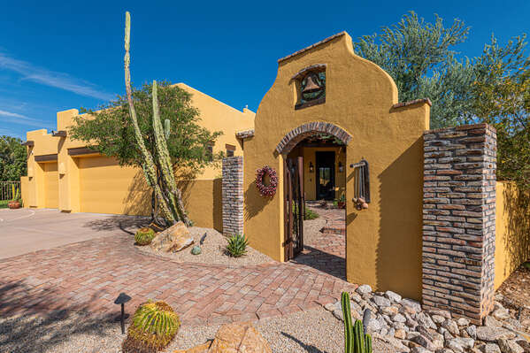 Spanish Style Home with Welcoming Front Courtyard!