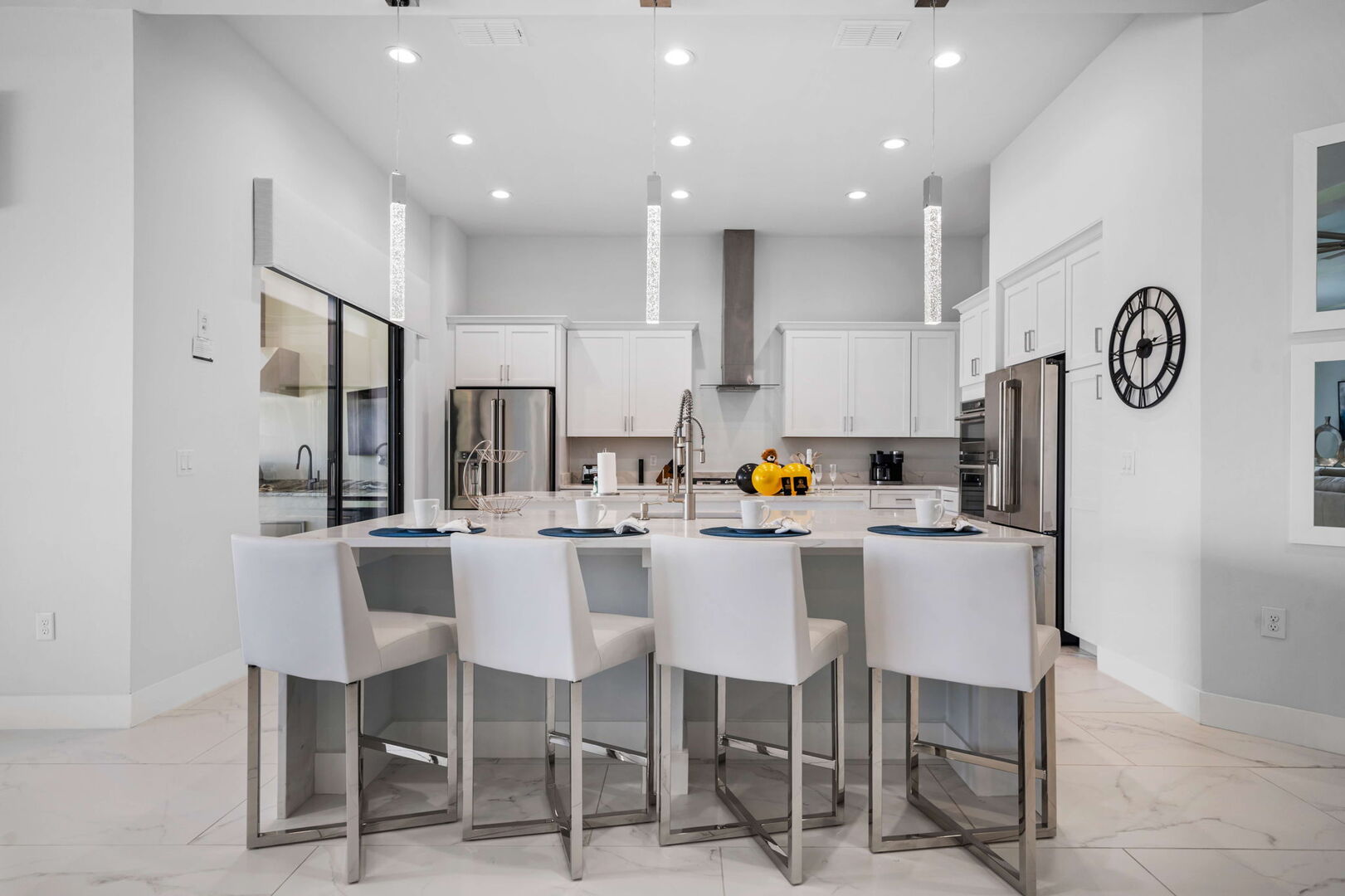 Sit down at the bar top whilst the family cooks up some home cooked meals