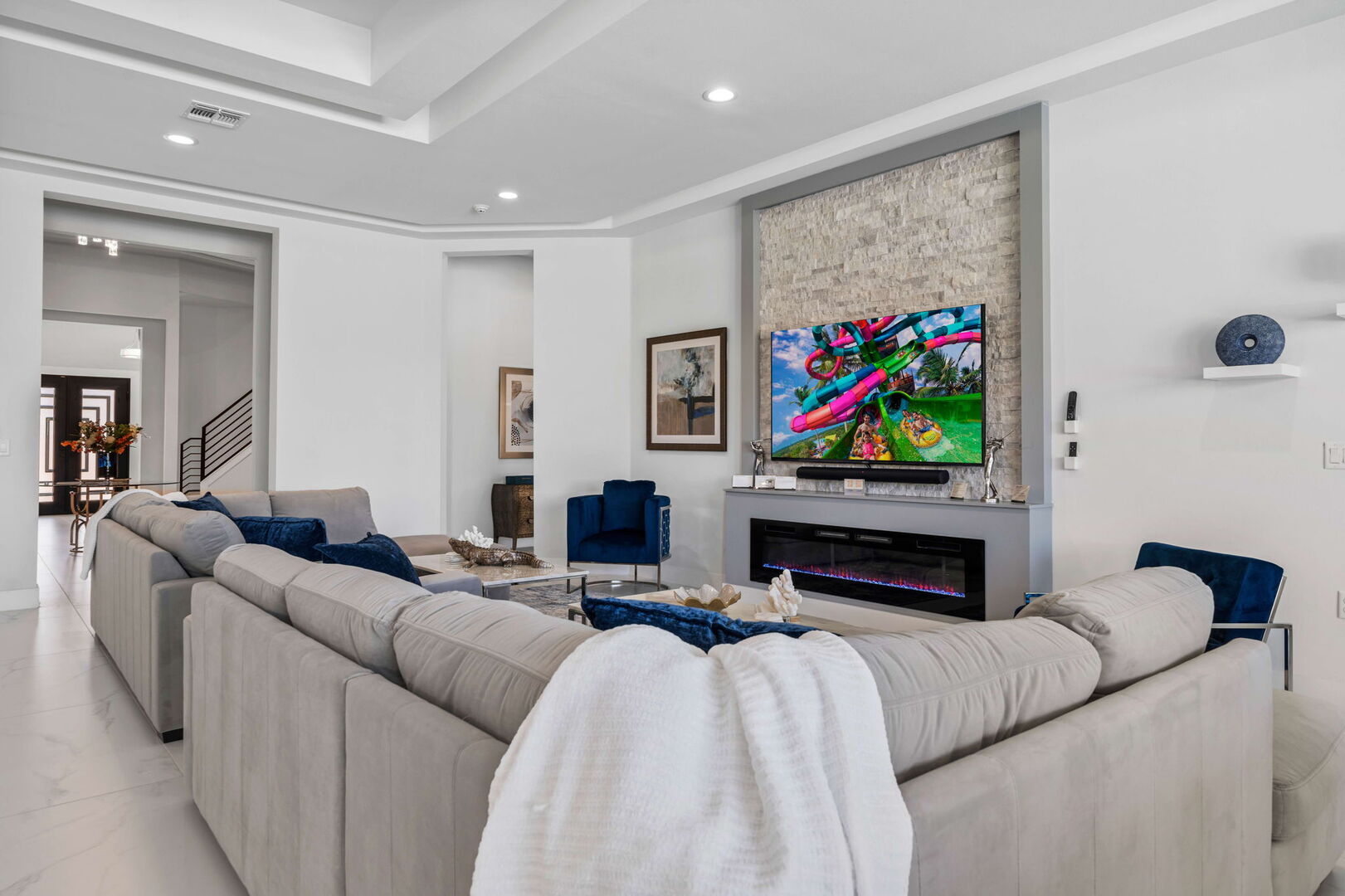 Gather in style in the spacious living room, ideal for movie nights or conversations