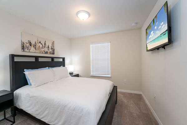 Master bedroom 2 has queen bed, wall mounted flatscreen TV