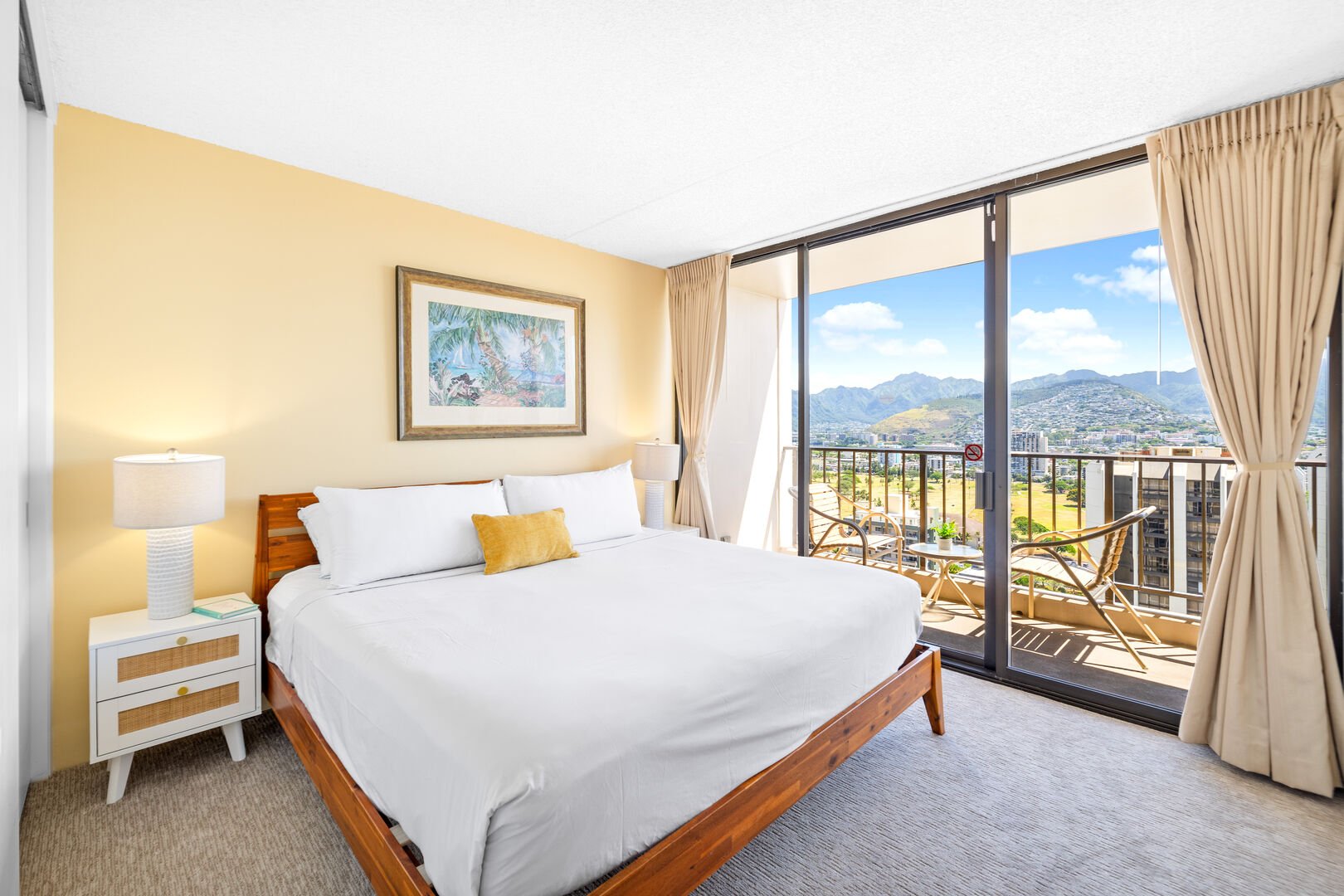 The bedroom has a king-size bed and a beautiful view!