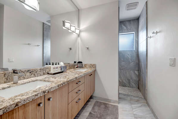 With dual sink vanity and walk in shower