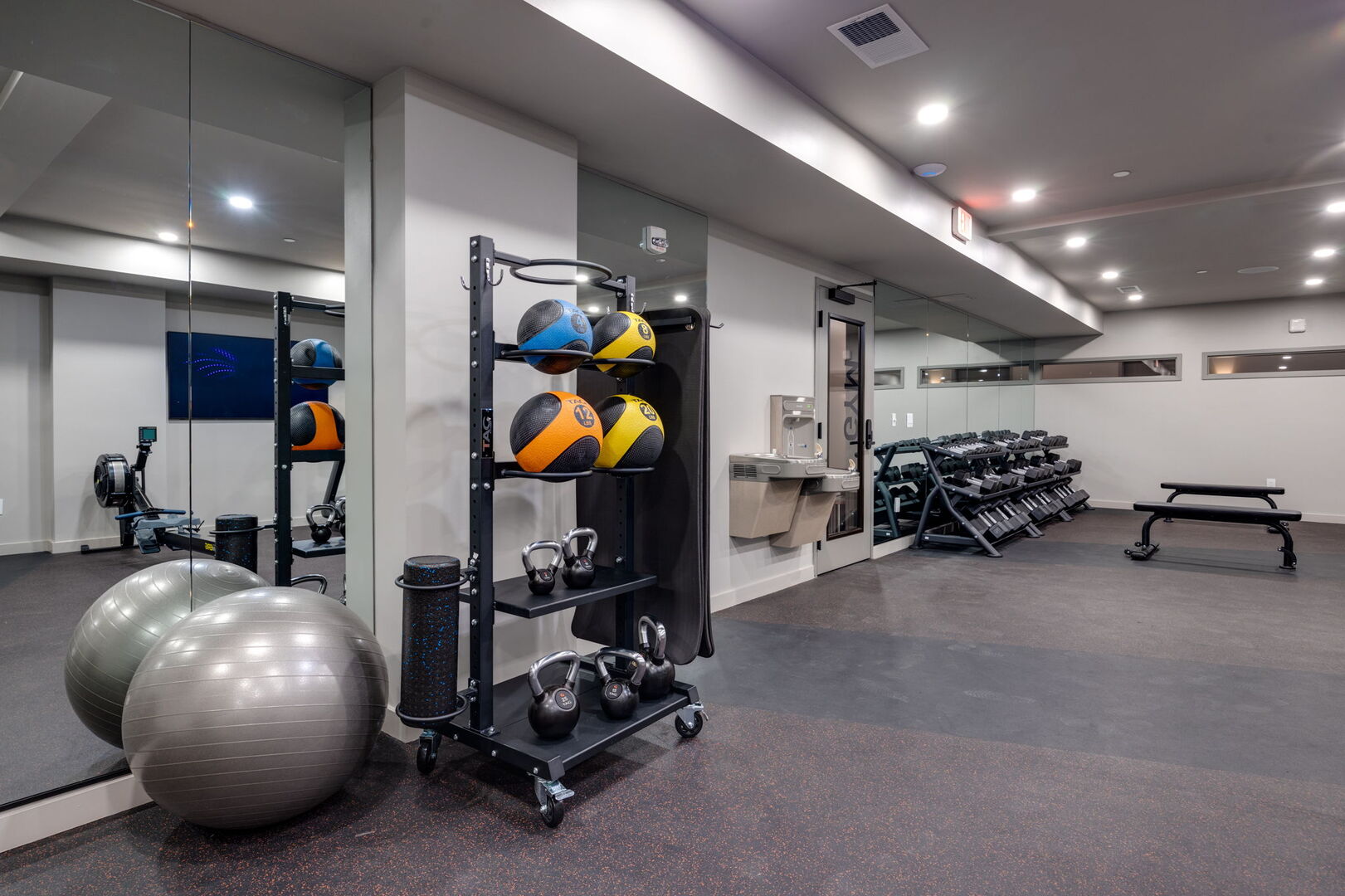 Communal Area: Gym offering a wide range of workout equipment, and a Smart TV.