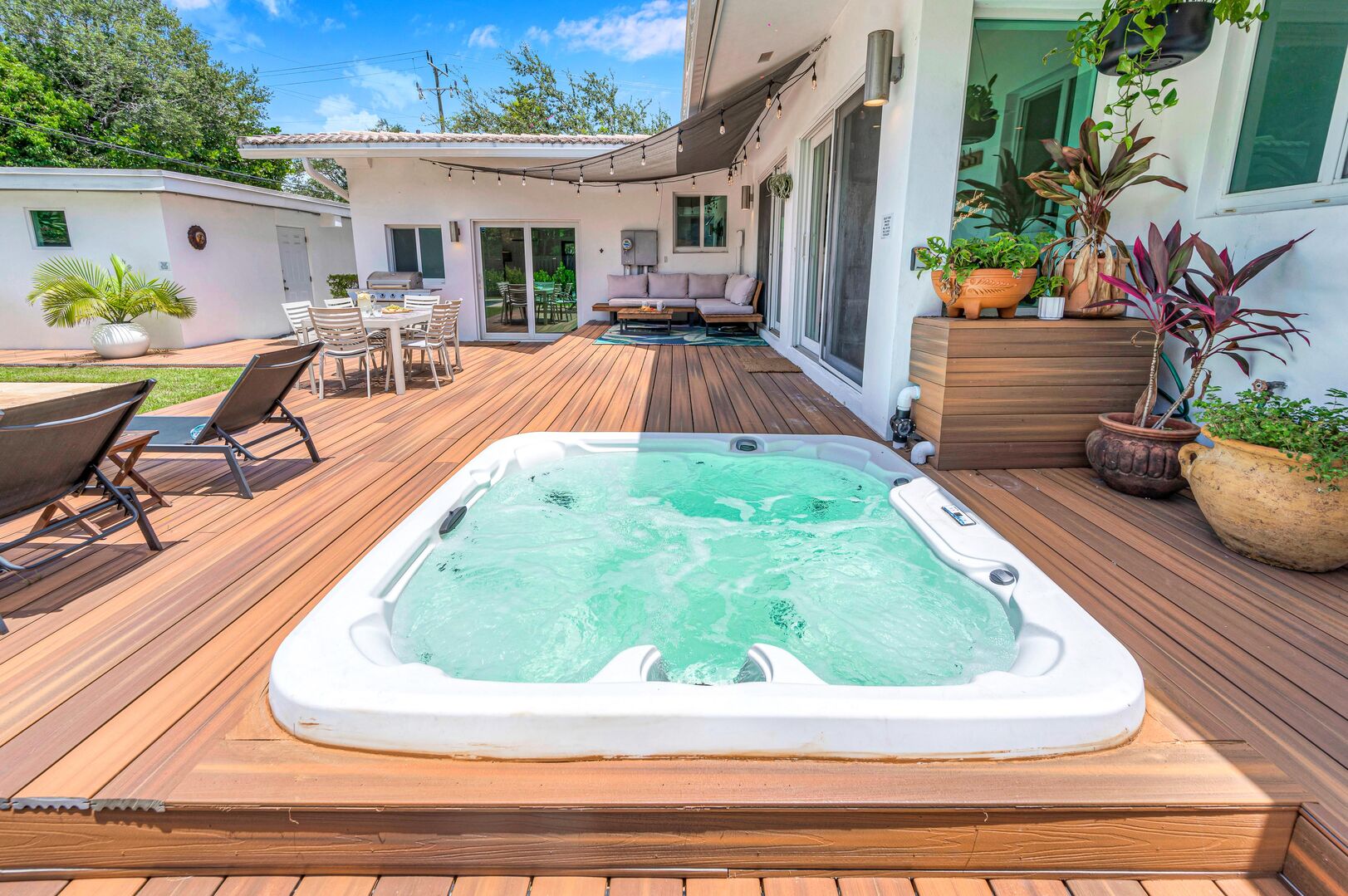 Immerse Yourself in Bliss with Our Inviting Hot Tub. A Sanctuary of Relaxation Awaits.