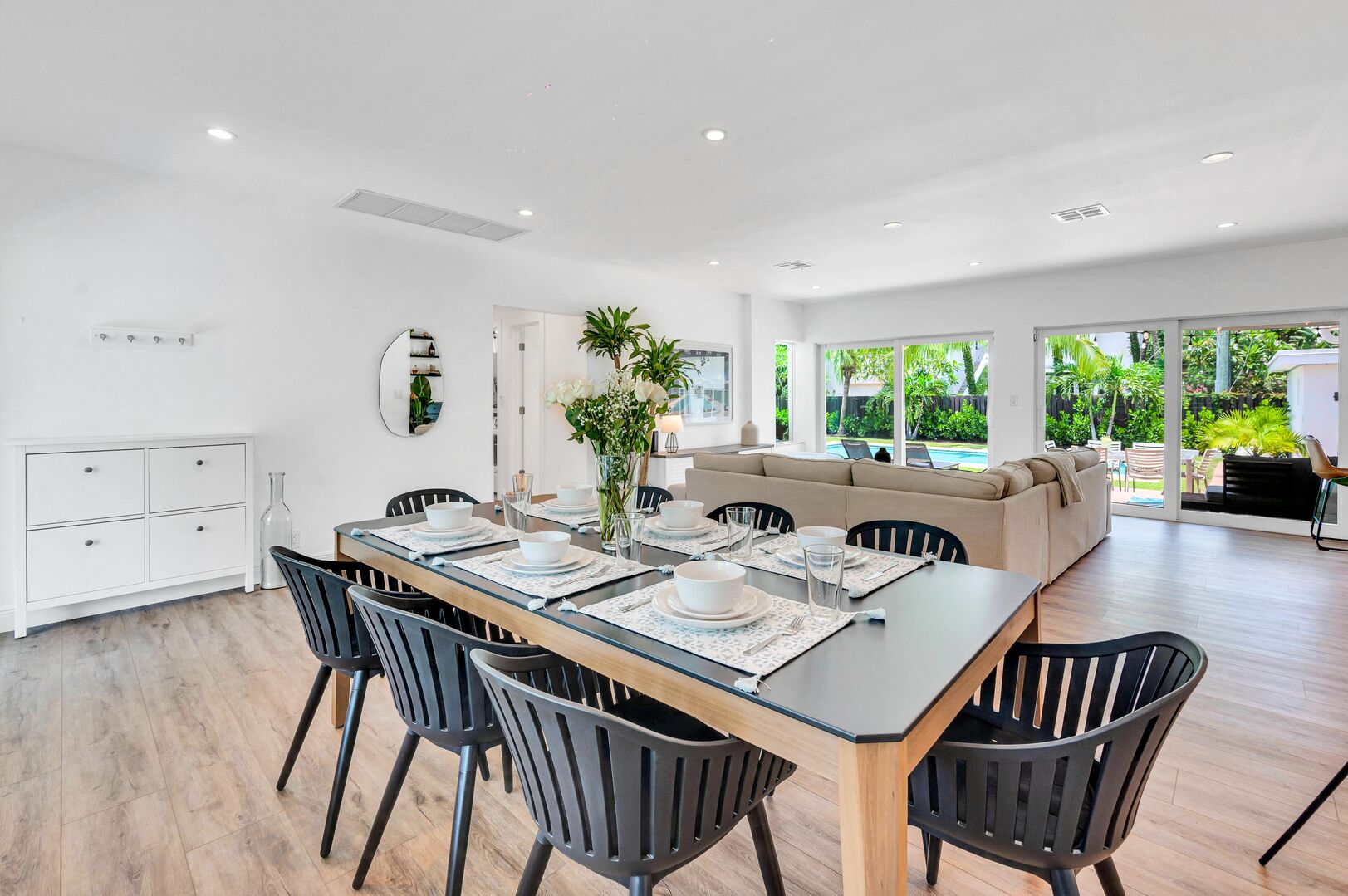 Seamless Entertaining: Experience the Perfect Blend of Style and Space in Our Open Floor Plan Dining Room for Eight. Where Culinary Delights and Conversations Flow Freely.