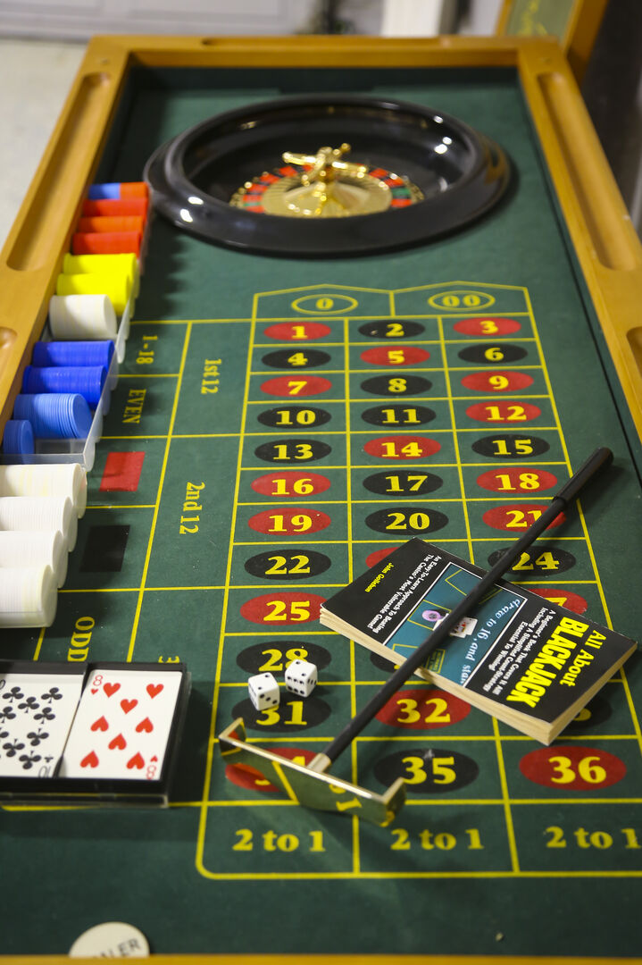 In the garage, discover a Multi Game Casino Table featuring Blackjack and Roulette, complete with all the accessories you need for a night of gaming fun!