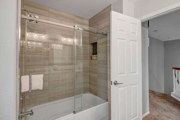 Full Shared Bathroom 2 (Upper Level) with Dual Sinks and Tub/Shower Combo