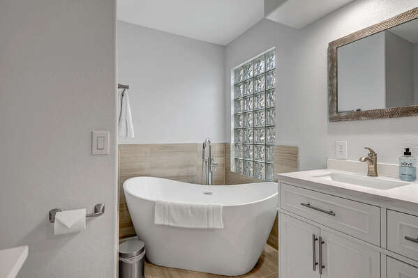 Relax in the Oversize Master Tub