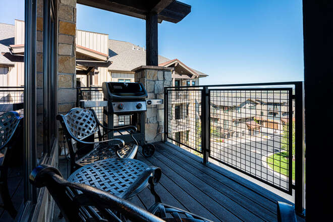 Private balcony with mountain views and propane grill