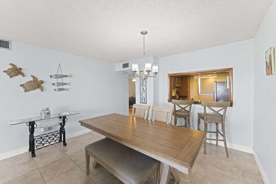 Savor a delectable feast in this comfortable dining area, perfect for intimate meals.