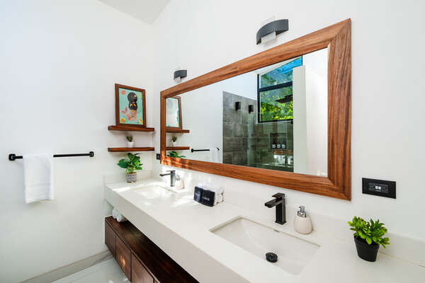#1. His and Hers Double Sink Bathroom, Each with Its Own Side, and a Spacious, Modern Shower