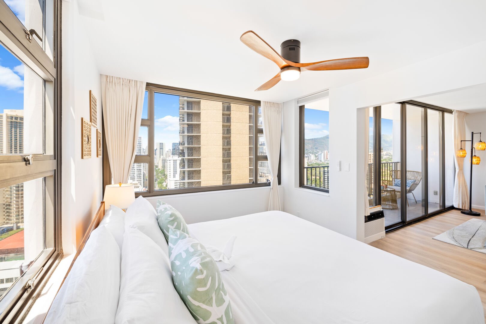 The bedroom has a king-size bed and ceiling fan to keep your cool!
