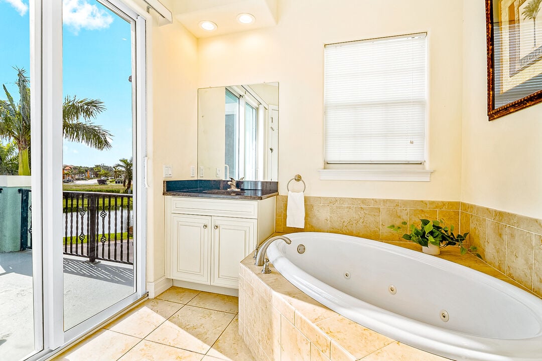 Soak, relax, and recharge in the bathroom's jet tub