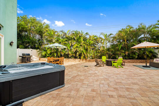 Big fenced in back yard with hot tub for hosting the family and friends!