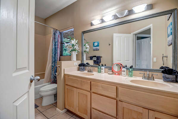 Full Shared Bathroom Two with Dual Sinks and Tub/Shower Combo