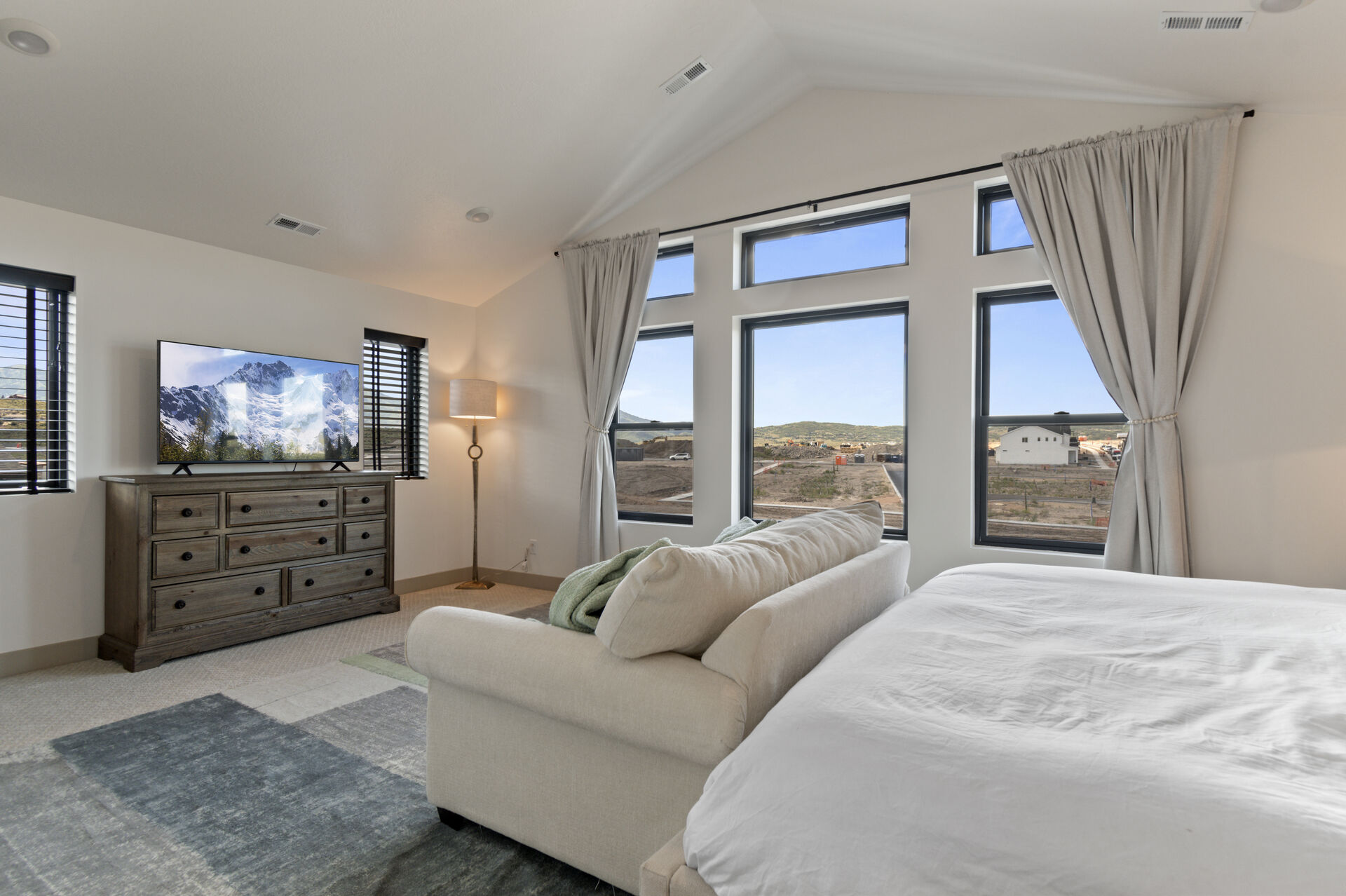 Master bedroom with plenty of natural light and oversize space.