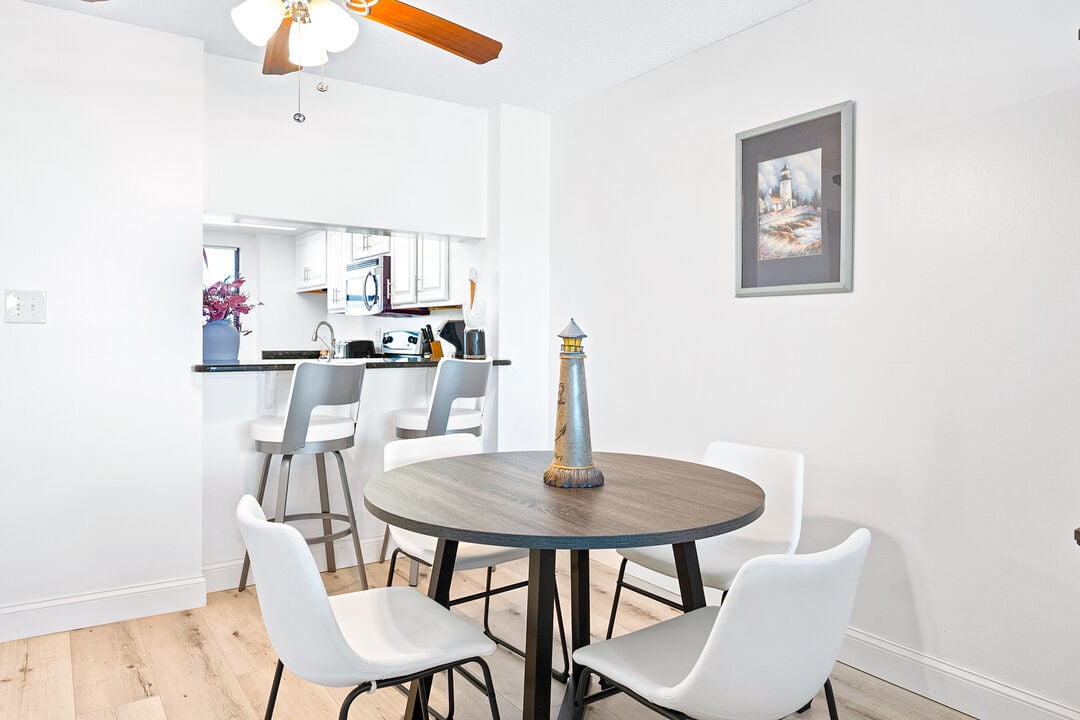 Bright and stylish dining area with an open-concept design, perfect for enjoying meals with family and friends.