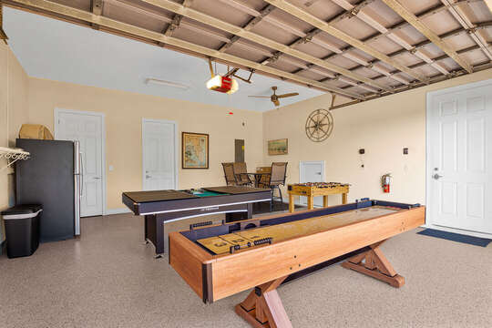 Recreation area with table games and comfortable seating.