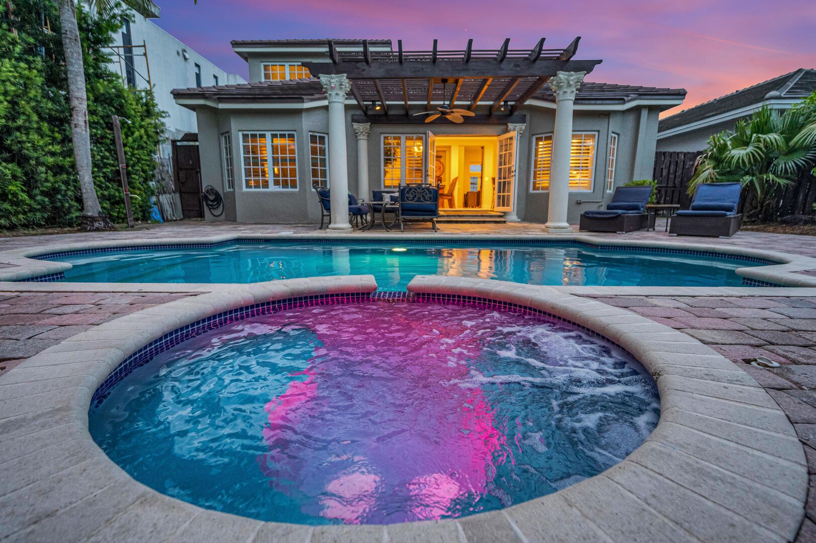 Enjoy the pool at night under the pink Florida sky.