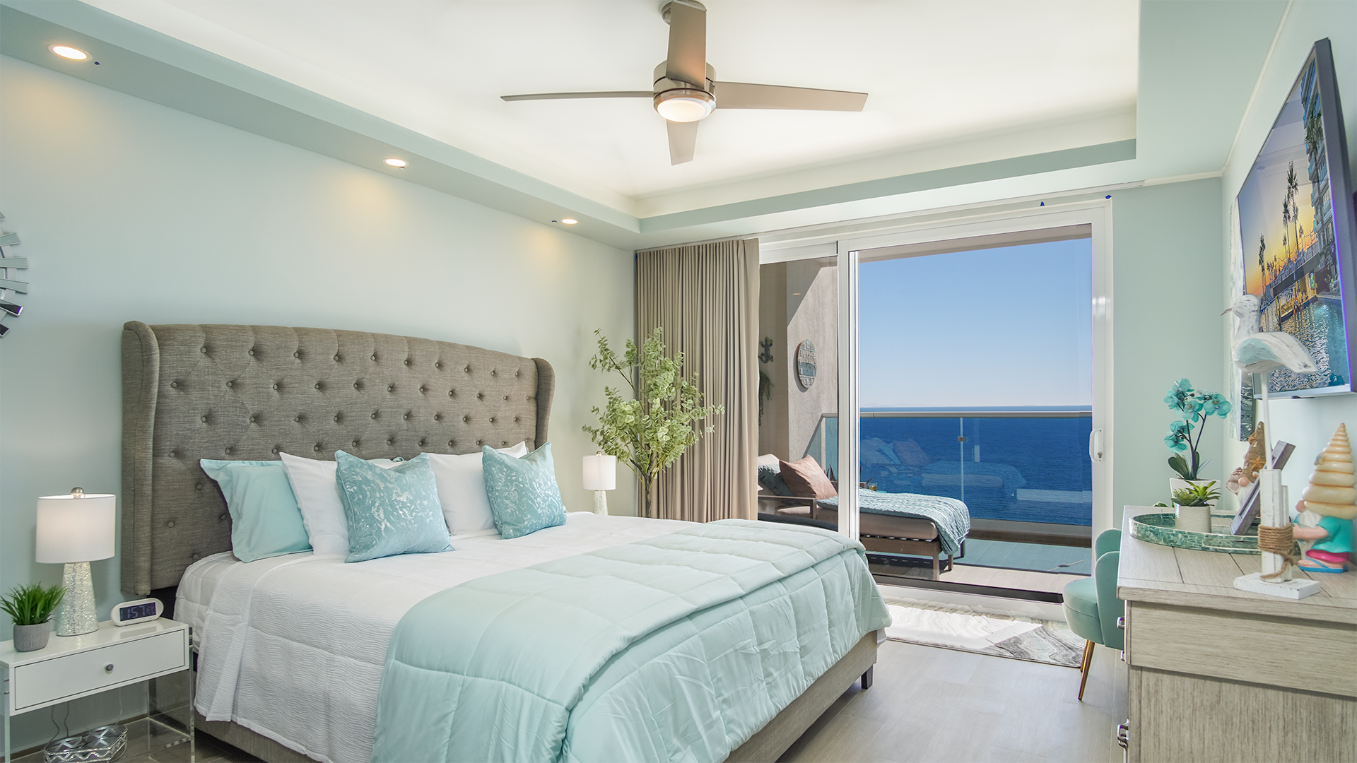 large master bedroom with king bed, and amazing ocean views.