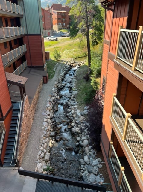 Bubbling brook running through Saw Creek Condominiums