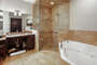 Master ensuite bathroom with shower and separate tub