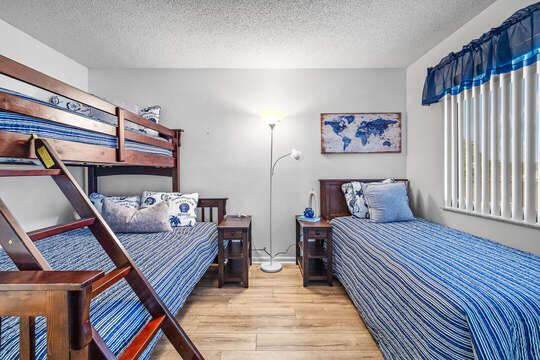 Kid-friendly bedroom featuring bunk beds for a fun and comfortable stay.