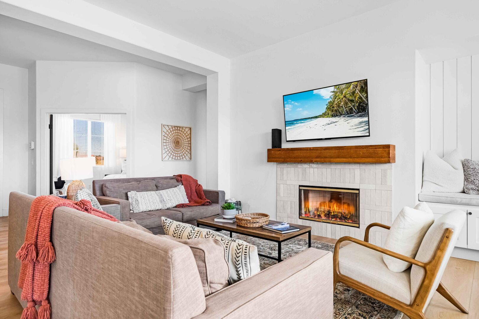 There is plenty of room in the living room to lounge in front of a 55-inch Toshiba Smart television and natural gas fireplace with comfort.