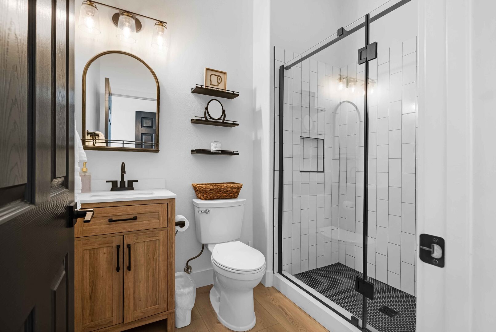 Suite 2 private, en suite bathroom features a tile shower and a vanity sink.