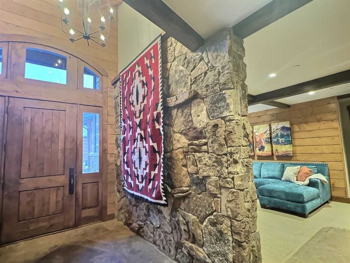Notice the intricate stonework walls, fun colors, luxurious furniture, and unique designs that make our home a one-of-a-kind experience.