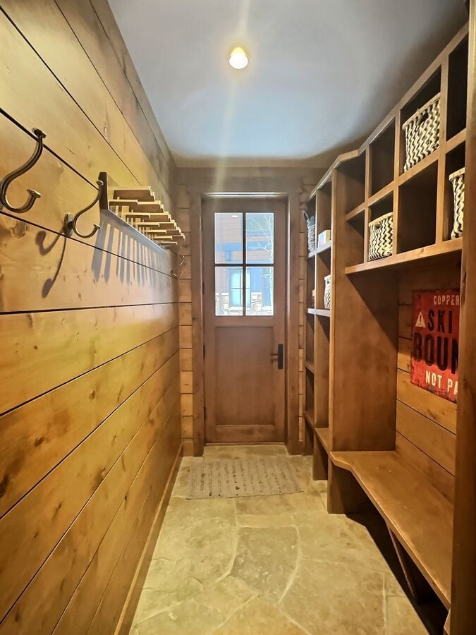Our large mudroom is perfect for storing all your gear, featuring ample ski racks and space for your snow boots.