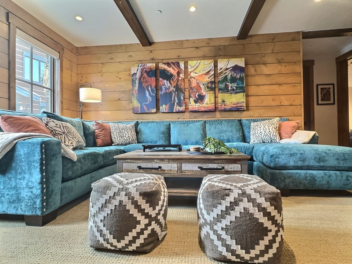Kick back in our incredible rec room, perfect for movie nights, board games, or simply watching the kids play in this versatile space.