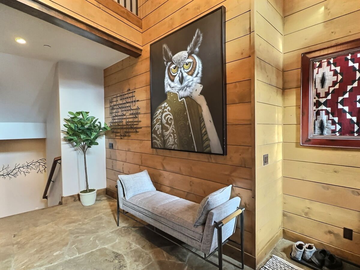 Admire custom artwork, stonework, timber, and wood accents throughout our incredible home, each element adding to its unique character.