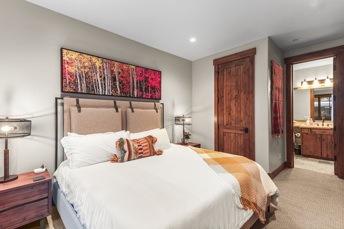 The 3rd King Master bedroom, with ultra-soft sheets and a plush ensuite, ensures a supremely comfortable stay, complete with a TV for relaxation.