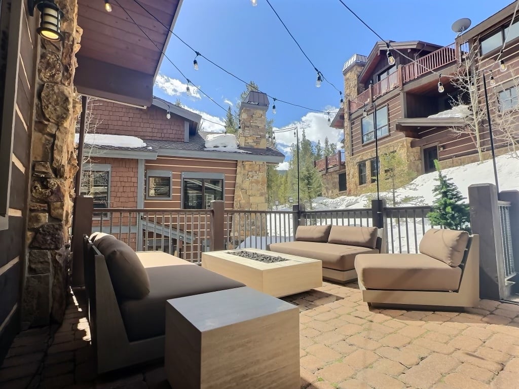 Our main-floor patio, equipped with luxurious furnishings, a gas firepit, and a gourmet BBQ setup, extends an invitation for unforgettable moments.