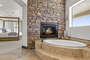 Master Suite -  Jetted Soaking Tub and Fireplace