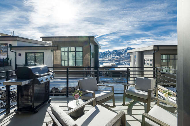 2nd level balcony with patio seating, BBQ and mountain views